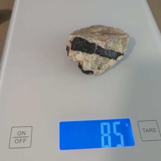 Black Tourmaline in Quartz Crystal Hand Mined by Io Crystals in Ocean View Mines in San Diego, CA